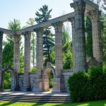 Scarborough, Canada - September 29, 2024: Ancient stone columns forming a structure known as The Greek Theater in Guild Park and Gardens. The public park exhibits ruins of colonial demolished buildings in the city.